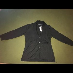 Brand new, never worn, tags on black cardigan.